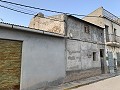 Reforma de casa adosada con Jardín in Pinoso Villas